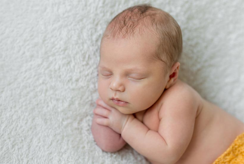 picture of baby with unique boy name sleeping
